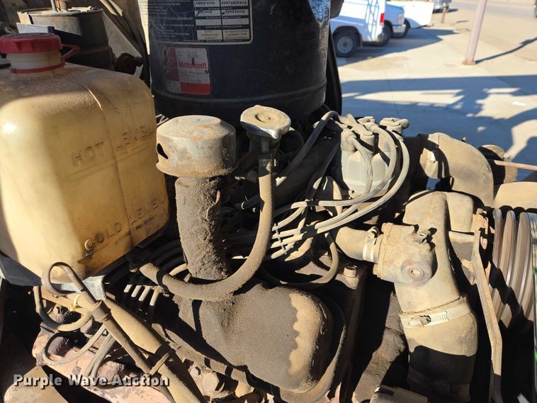 image for item ES2888 1981 Ford 900 digger derrick truck