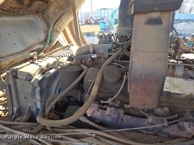 image for item ES2888 1981 Ford 900 digger derrick truck