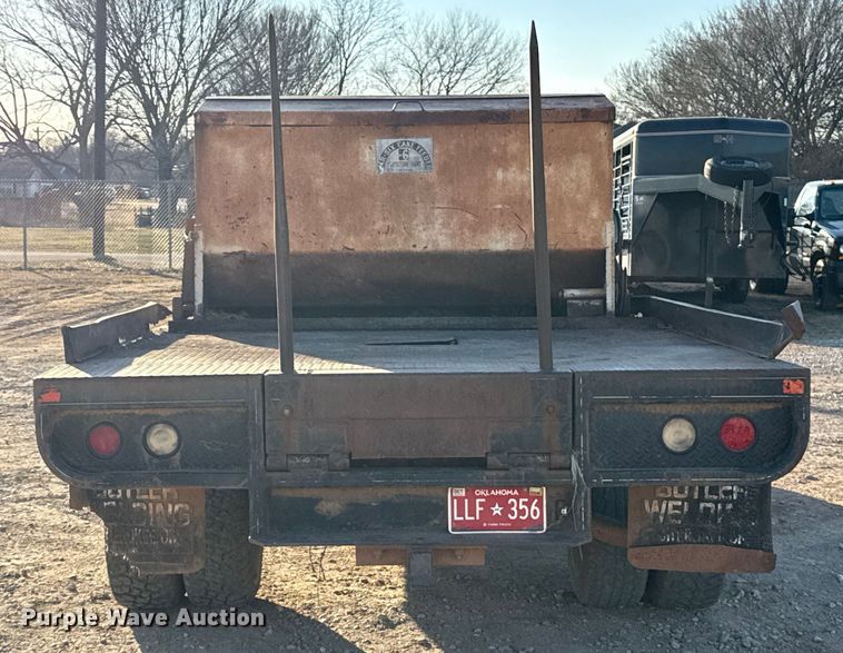 image for item ES5791 2006 Ford F350 Ext. Cab flatbed pickup truck