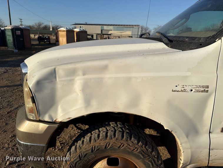 image for item ES5791 2006 Ford F350 Ext. Cab flatbed pickup truck