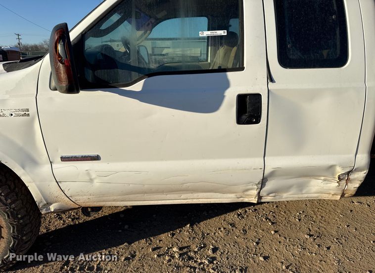 image for item ES5791 2006 Ford F350 Ext. Cab flatbed pickup truck