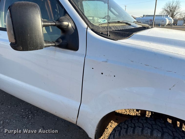 image for item ES5791 2006 Ford F350 Ext. Cab flatbed pickup truck