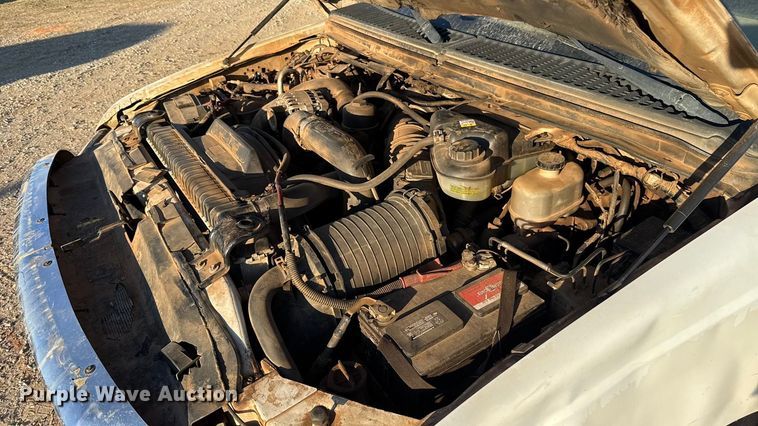 image for item ES5791 2006 Ford F350 Ext. Cab flatbed pickup truck