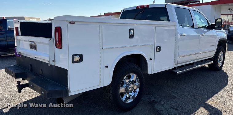 image for item ES8554 2018 GMC Sierra 2500HD Crew Cab utility bed pickup truck