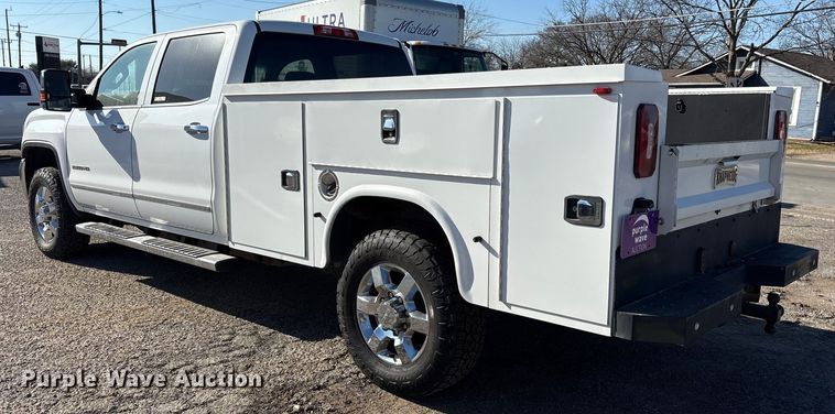 image for item ES8554 2018 GMC Sierra 2500HD Crew Cab utility bed pickup truck