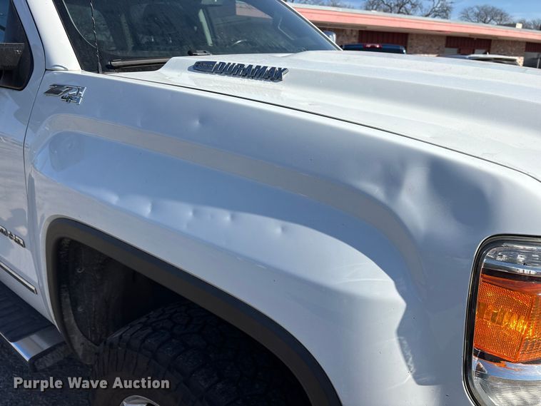 image for item ES8554 2018 GMC Sierra 2500HD Crew Cab utility bed pickup truck