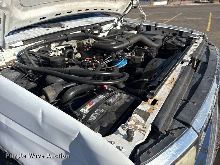 image for item EU4098 1995 Ford F250 Ext. Cab flatbed pickup truck