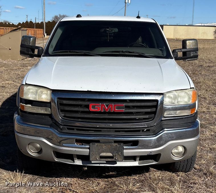 image for item EU4844 2005 GMC Sierra Crew Cab flatbed pickup truck