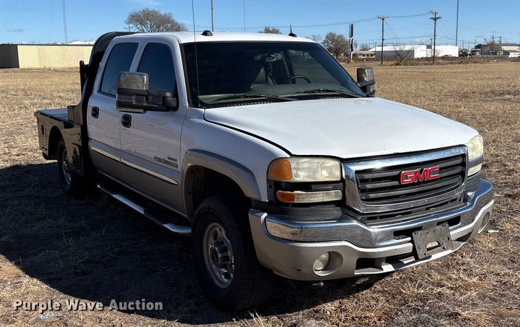 image for item EU4844 2005 GMC Sierra Crew Cab flatbed pickup truck