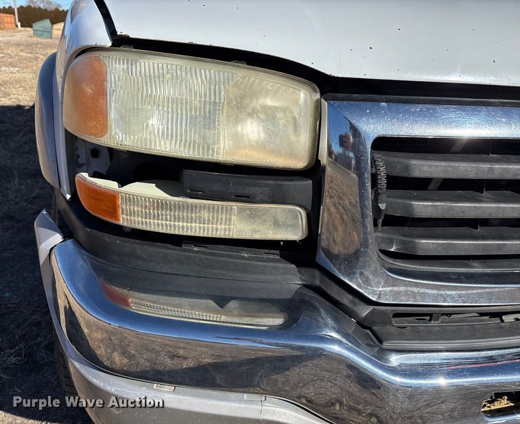 image for item EU4844 2005 GMC Sierra Crew Cab flatbed pickup truck