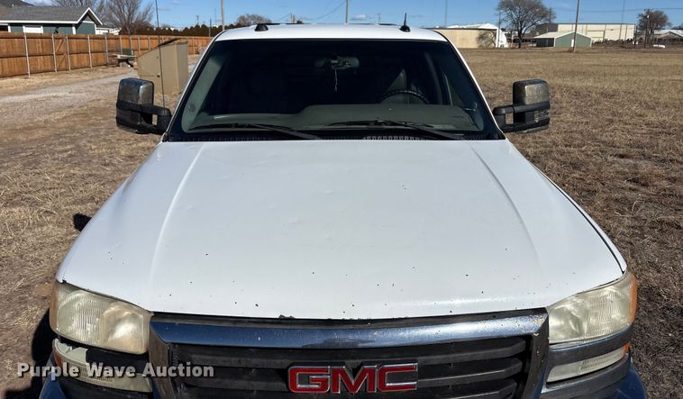 image for item EU4844 2005 GMC Sierra Crew Cab flatbed pickup truck