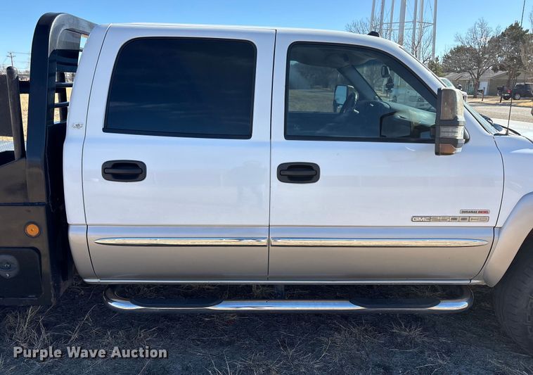 image for item EU4844 2005 GMC Sierra Crew Cab flatbed pickup truck