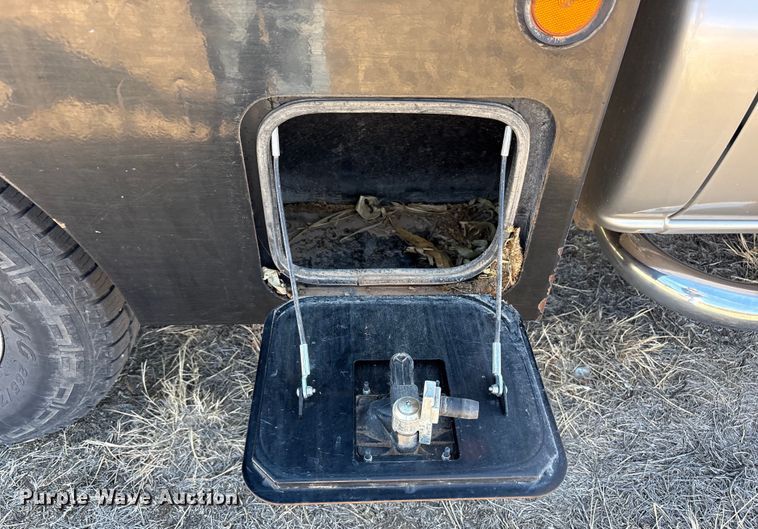 image for item EU4844 2005 GMC Sierra Crew Cab flatbed pickup truck