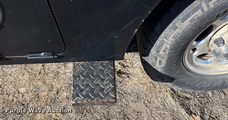 image for item EU4844 2005 GMC Sierra Crew Cab flatbed pickup truck