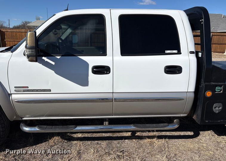 image for item EU4844 2005 GMC Sierra Crew Cab flatbed pickup truck