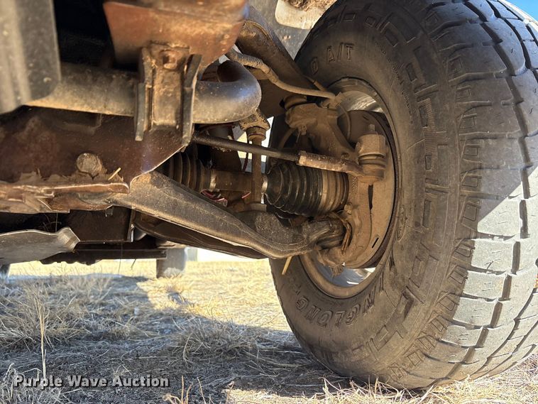 image for item EU4844 2005 GMC Sierra Crew Cab flatbed pickup truck