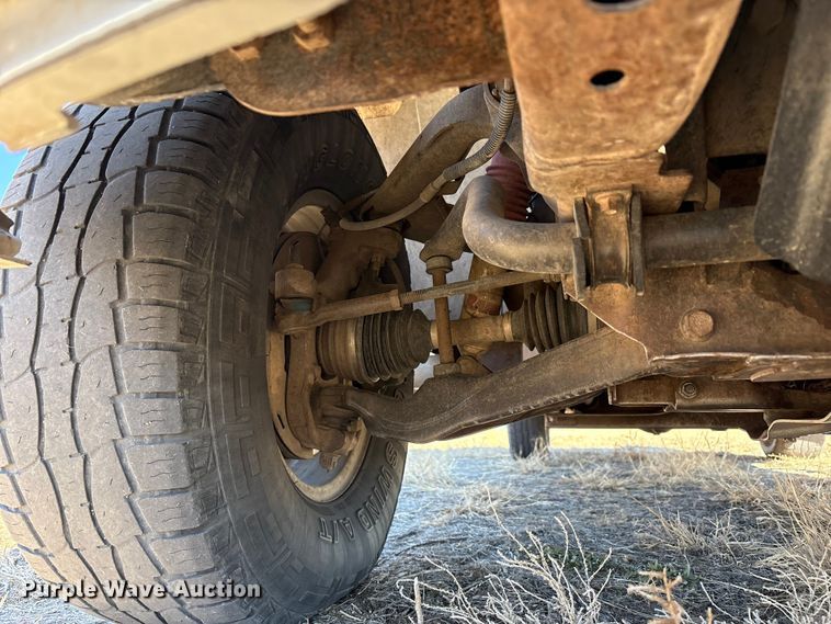 image for item EU4844 2005 GMC Sierra Crew Cab flatbed pickup truck