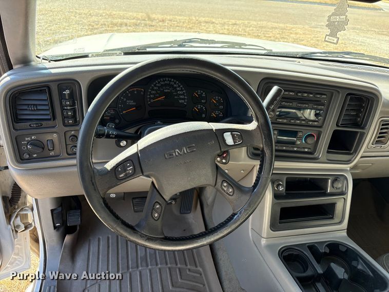 image for item EU4844 2005 GMC Sierra Crew Cab flatbed pickup truck