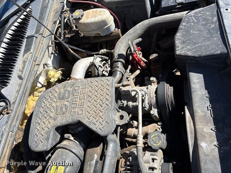 image for item EU4844 2005 GMC Sierra Crew Cab flatbed pickup truck