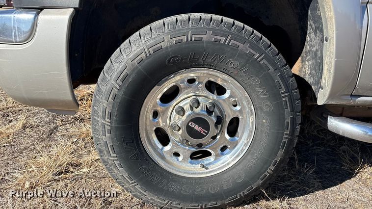 image for item EU4844 2005 GMC Sierra Crew Cab flatbed pickup truck