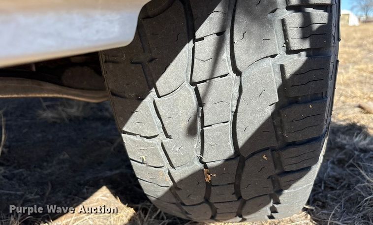 image for item EU4844 2005 GMC Sierra Crew Cab flatbed pickup truck