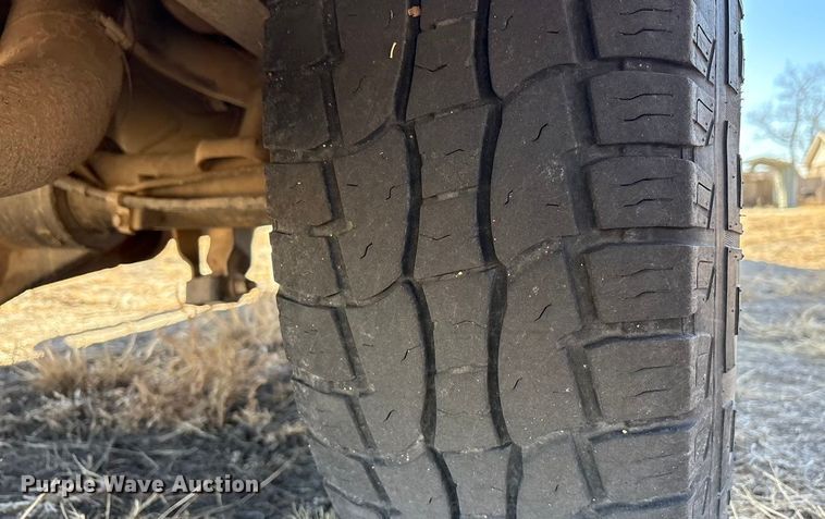 image for item EU4844 2005 GMC Sierra Crew Cab flatbed pickup truck