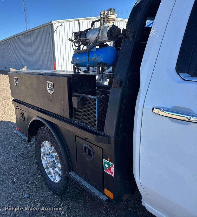 image for item FB0631 2024 Chevrolet Silverado 2500HD Crew Cab flatbed pickup truck