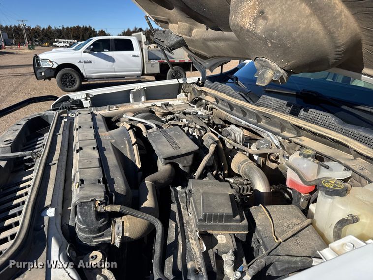 image for item FB0631 2024 Chevrolet Silverado 2500HD Crew Cab flatbed pickup truck