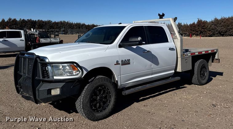 image for item FB0632 2017 RAM 3500 Crew Cab flatbed pickup truck