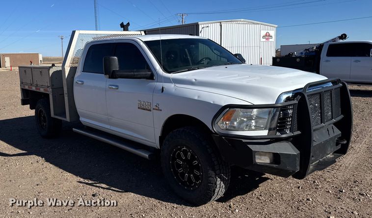 image for item FB0632 2017 RAM 3500 Crew Cab flatbed pickup truck