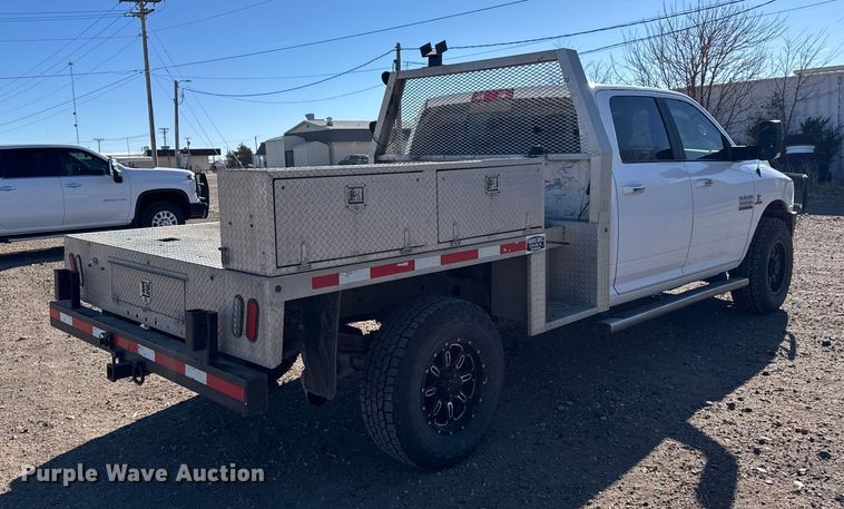 image for item FB0632 2017 RAM 3500 Crew Cab flatbed pickup truck