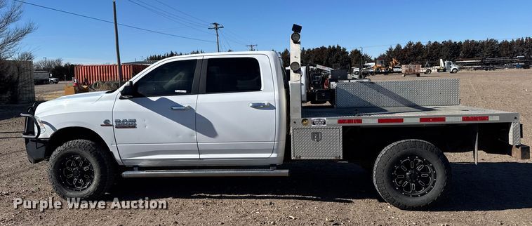 image for item FB0632 2017 RAM 3500 Crew Cab flatbed pickup truck