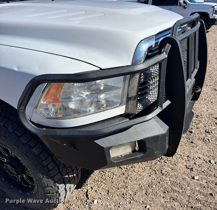 image for item FB0632 2017 RAM 3500 Crew Cab flatbed pickup truck