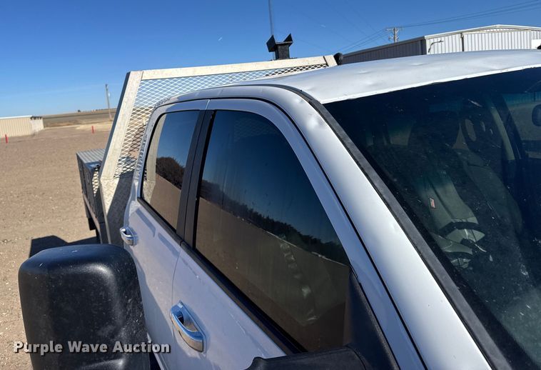 image for item FB0632 2017 RAM 3500 Crew Cab flatbed pickup truck