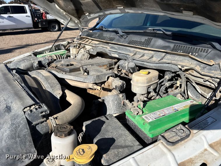 image for item FB0632 2017 RAM 3500 Crew Cab flatbed pickup truck