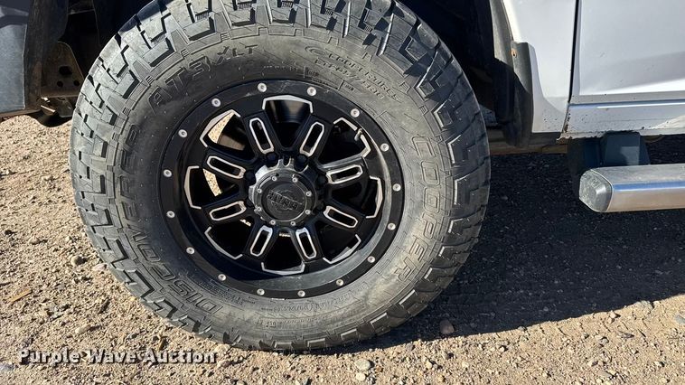 image for item FB0632 2017 RAM 3500 Crew Cab flatbed pickup truck