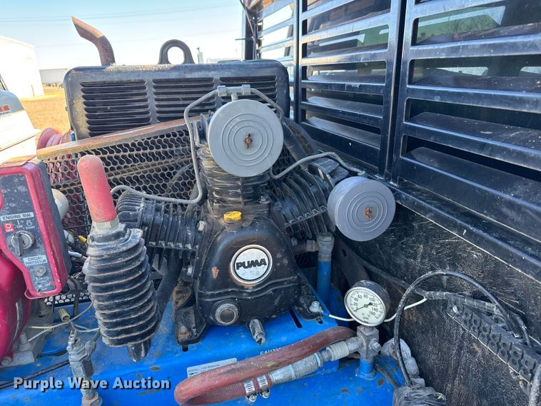 image for item FB0633 2022 Chevrolet Silverado 3500HD Crew Cab flatbed pickup truck