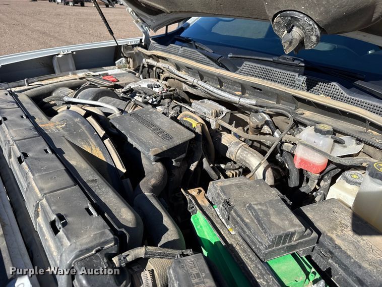 image for item FB0633 2022 Chevrolet Silverado 3500HD Crew Cab flatbed pickup truck