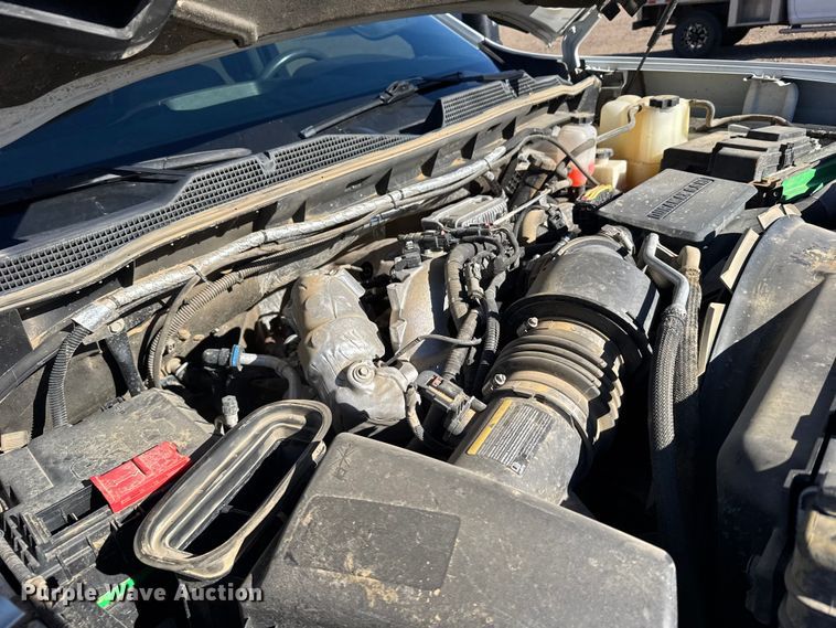 image for item FB0633 2022 Chevrolet Silverado 3500HD Crew Cab flatbed pickup truck