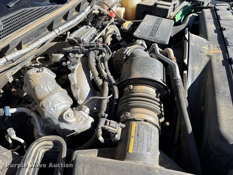 image for item FB0633 2022 Chevrolet Silverado 3500HD Crew Cab flatbed pickup truck