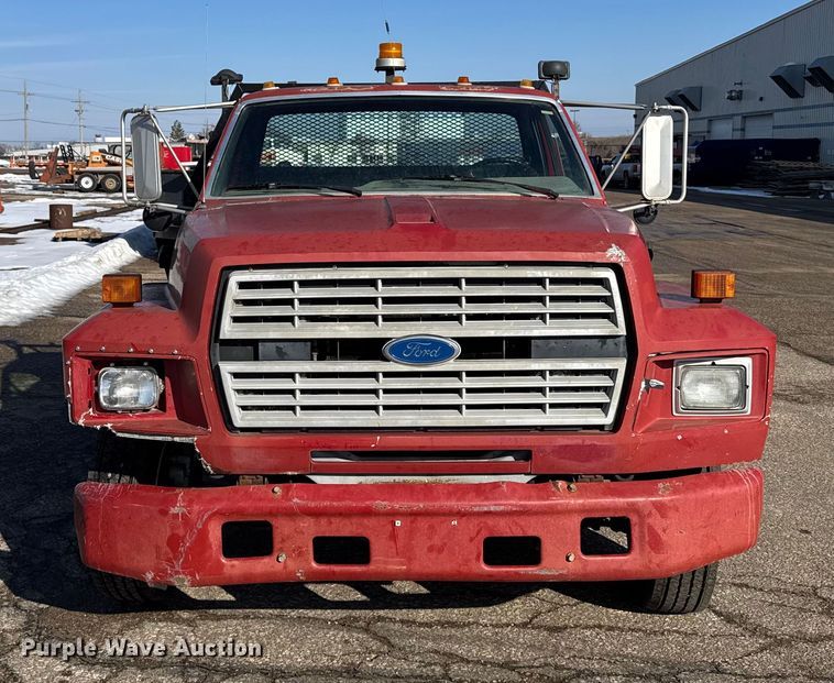 image for item FB0712 1994 Ford F600 flatbed truck