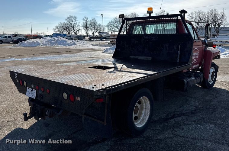 image for item FB0712 1994 Ford F600 flatbed truck