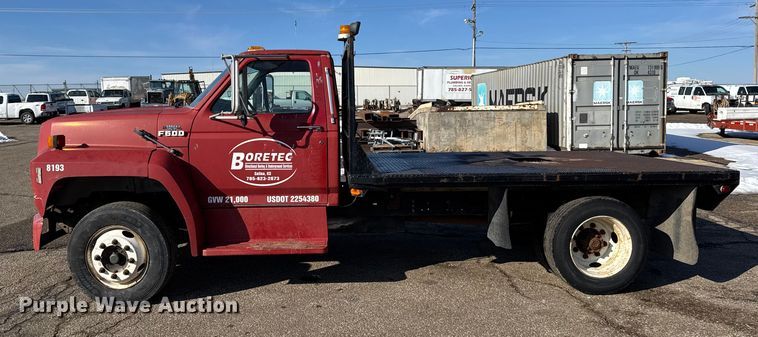 image for item FB0712 1994 Ford F600 flatbed truck