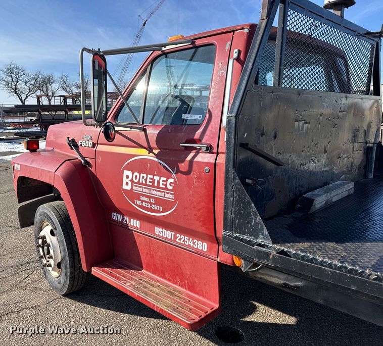 image for item FB0712 1994 Ford F600 flatbed truck