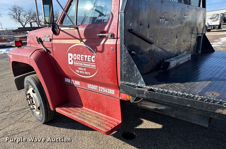image for item FB0712 1994 Ford F600 flatbed truck