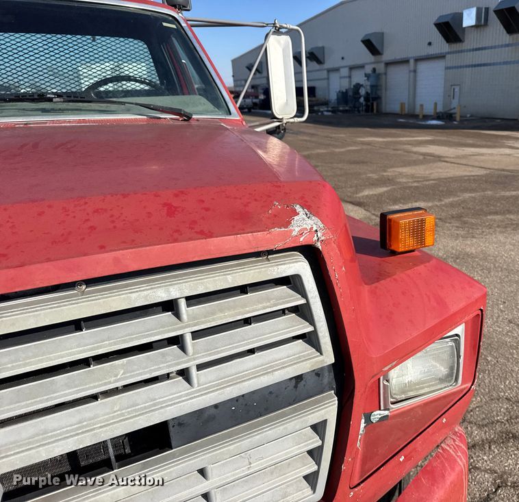 image for item FB0712 1994 Ford F600 flatbed truck