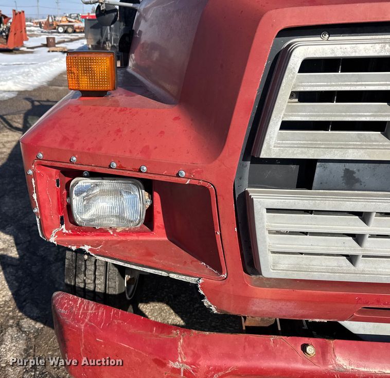 image for item FB0712 1994 Ford F600 flatbed truck