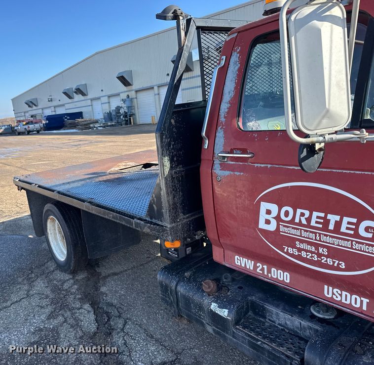 image for item FB0712 1994 Ford F600 flatbed truck