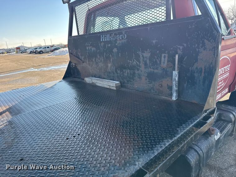 image for item FB0712 1994 Ford F600 flatbed truck