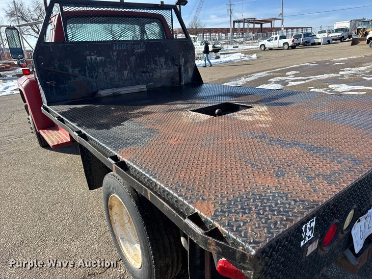 image for item FB0712 1994 Ford F600 flatbed truck